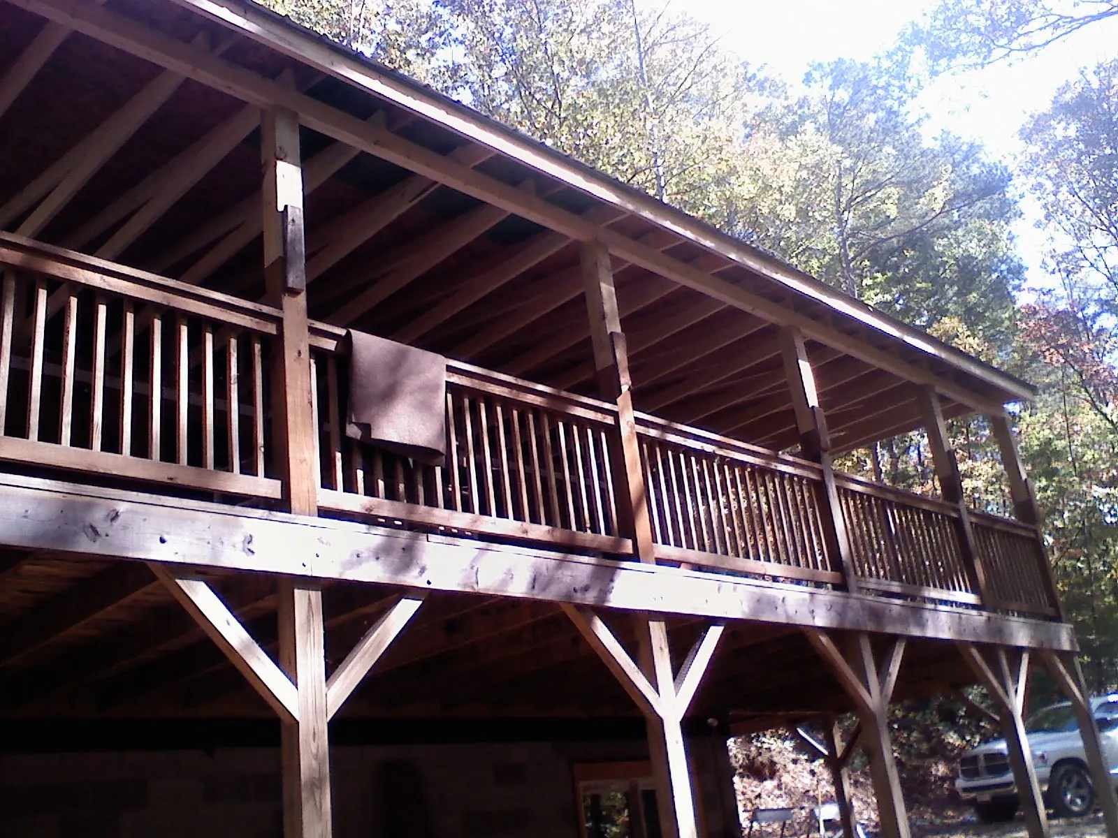 Timber framing under a new elevated porch and deck — Roof Leak Repair in Cuttyhunk by Roofing Brothers